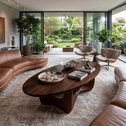 Round Sculptural Coffee Table With Open Pedestal Base