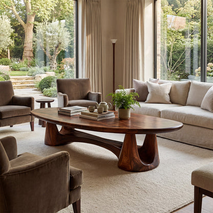 Organic Oval Coffee Table With Sculptural Pedestal Base