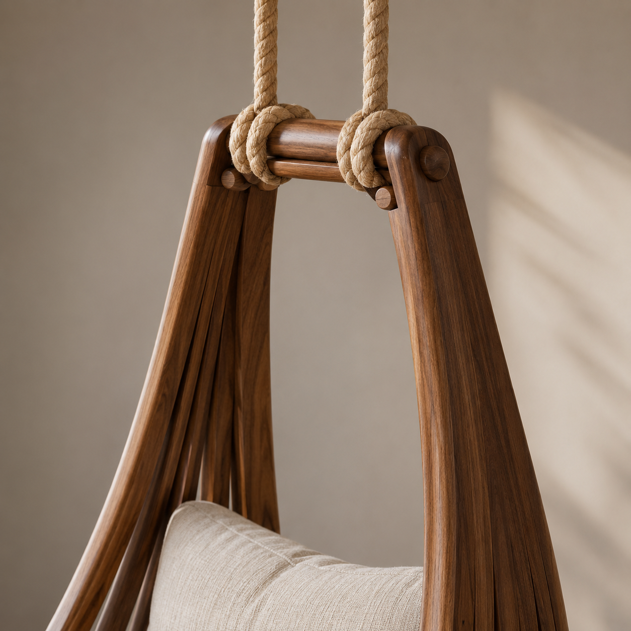 Solid Walnut Hanging Lounge Chair – Sculptural Wooden Swing Chair with Ivory Cushions