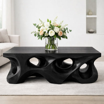 Solid Wood Coffee Table with Sculptural Hollow Base and Organic Carved Design